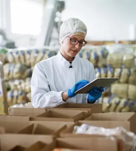A food scientist reviewing a chart.